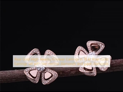 Biens de haute joaillerie en or réel Fiorever Boucles d'oreilles en or rose de 18 kt Ensemble de deux diamants centraux et de diamants pavé