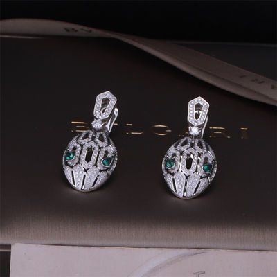 Qualité Les boucles d'oreille de luxe de Serpenti de marque d'or dans l'ensemble de l'or 18K blanc avec Emerald Eyes et avec des diamants de pavé serpentent la tête usine