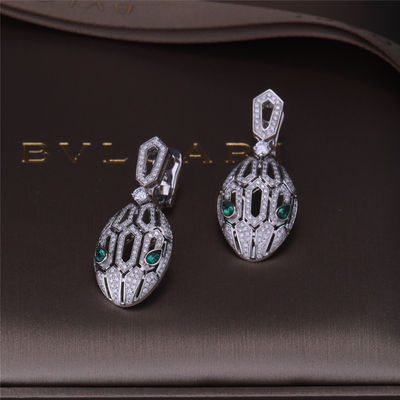 Qualité Les boucles d'oreille de luxe de Serpenti de marque d'or dans l'ensemble de l'or 18K blanc avec Emerald Eyes et avec des diamants de pavé serpentent la tête usine